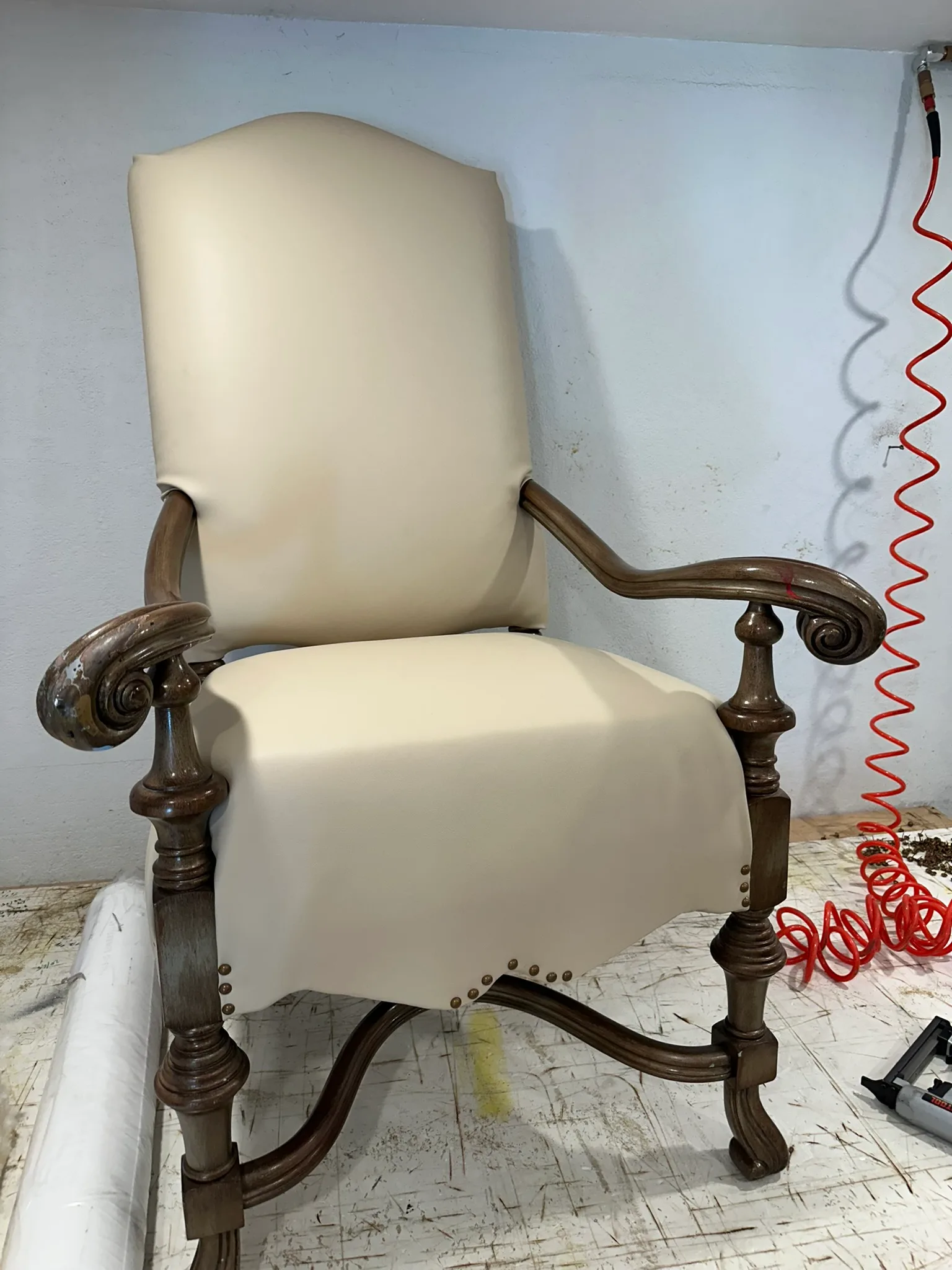 Reupholstered chair by GVO Classic Upholstery
